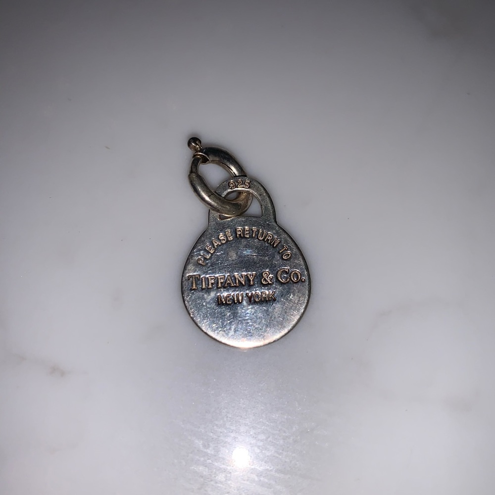 Return to Tiffany’s silver charm